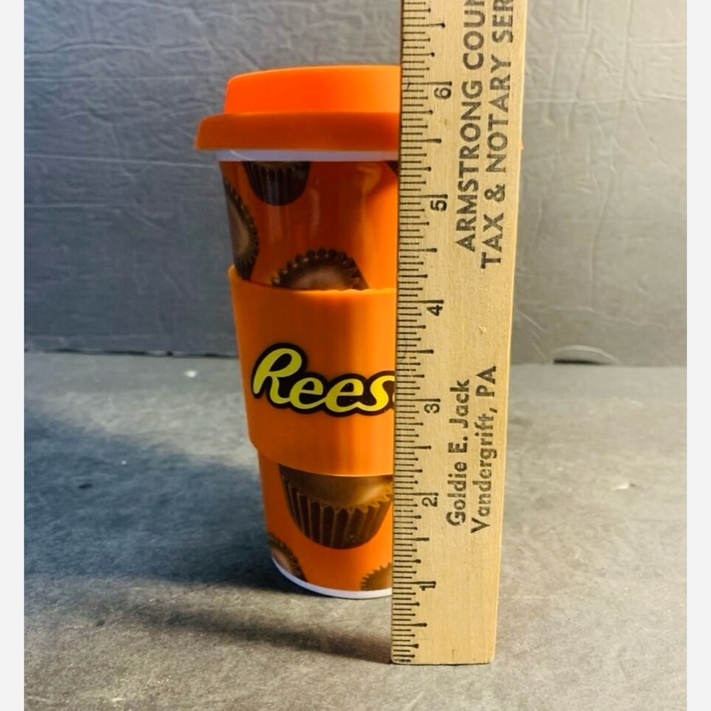 Reese’s Pieces Ceramic Travel Mug Orange Silicone Lid Protective Sleeve NWOT - Picture 2 of 7